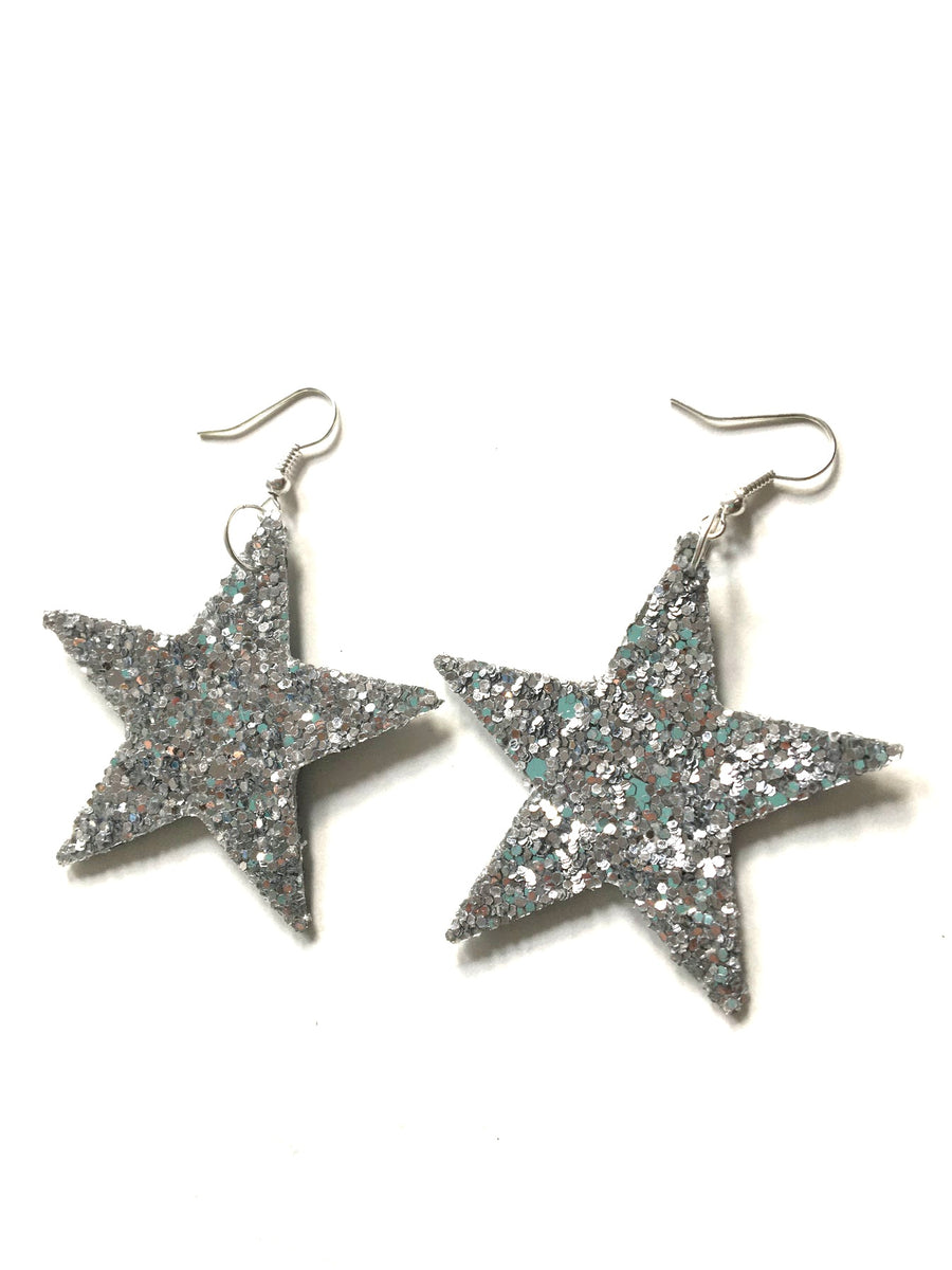 Silver glittery star shaped earrings