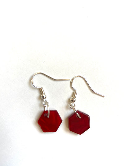 Red hex charm earrings