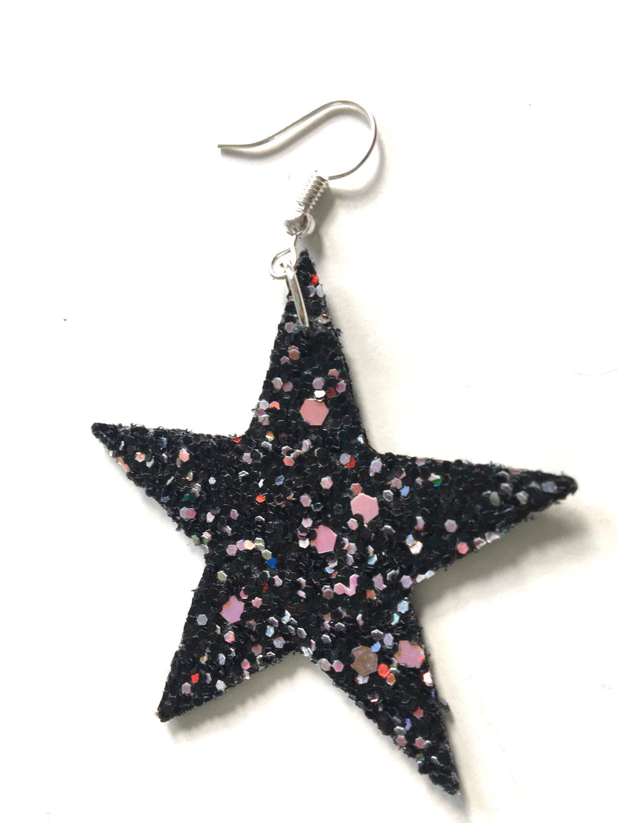 Pink and black glittery star shaped earrings